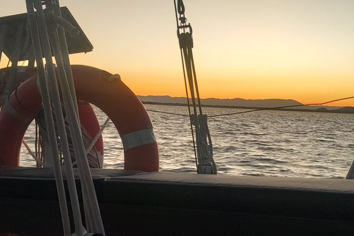 a boat that is sitting on the side of the road