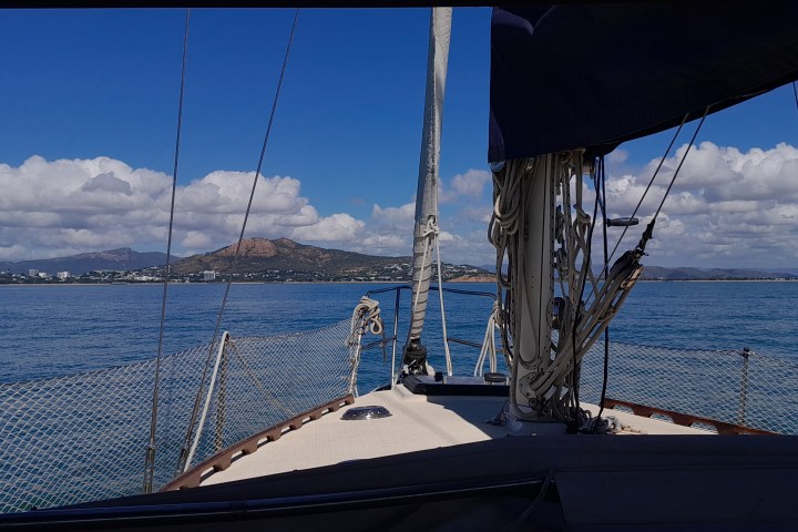 a close up of a bridge over a body of water