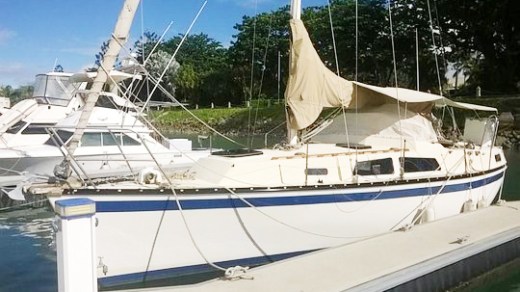 white boat on the ramp