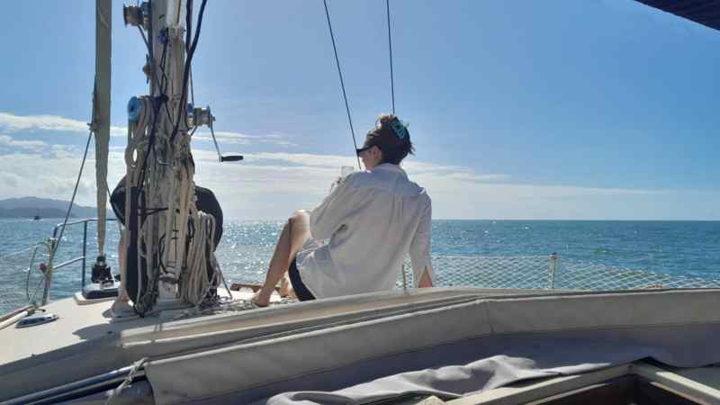 a couple of people on a boat in a body of water