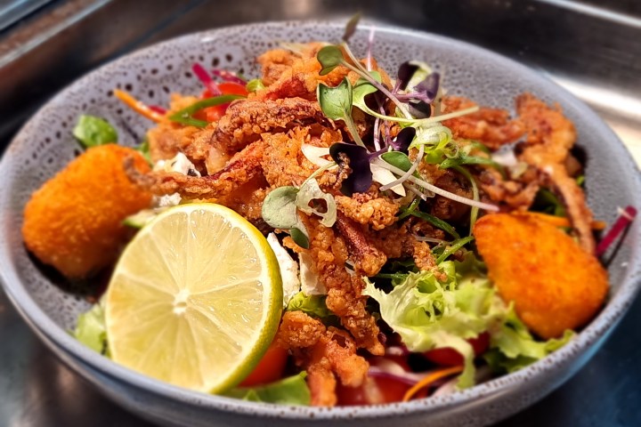 a bowl of food on a plate