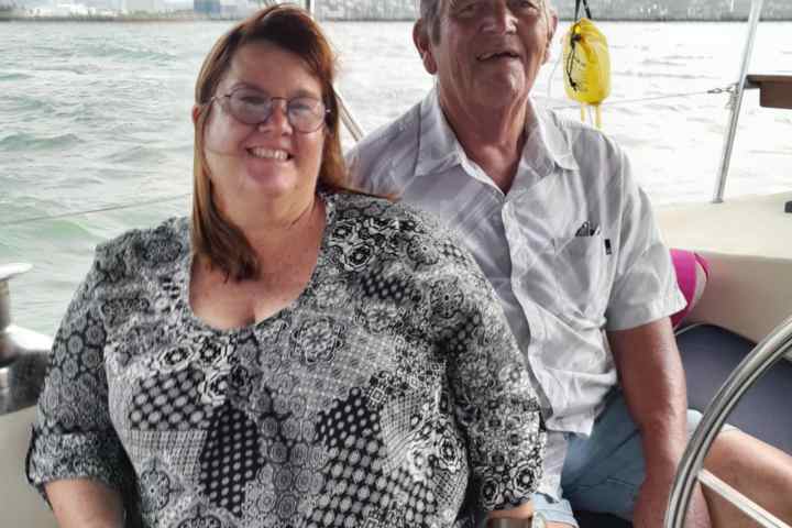 a couple of people that are sitting on a boat