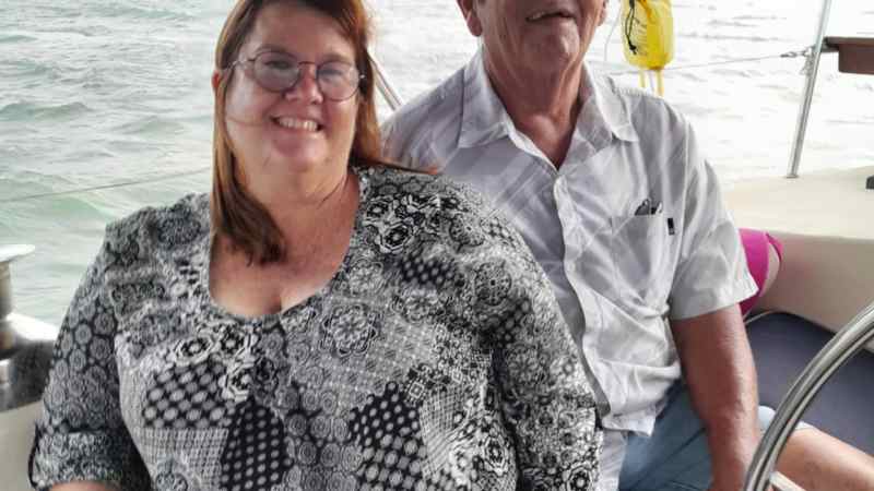 a couple of people that are sitting on a boat